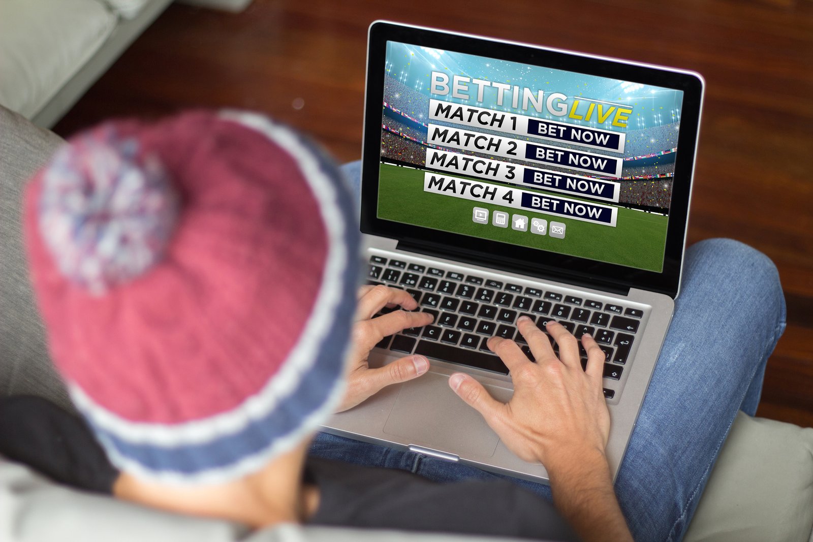 young man betting online . All screen graphics are made up.