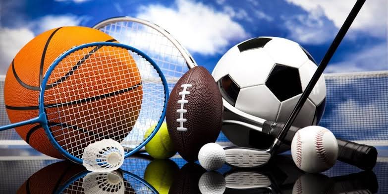 A Picture with Golf Ball, Soccer Ball , Basket Ball , Rugby Ball , Tennis Racket and Tennis Ball 